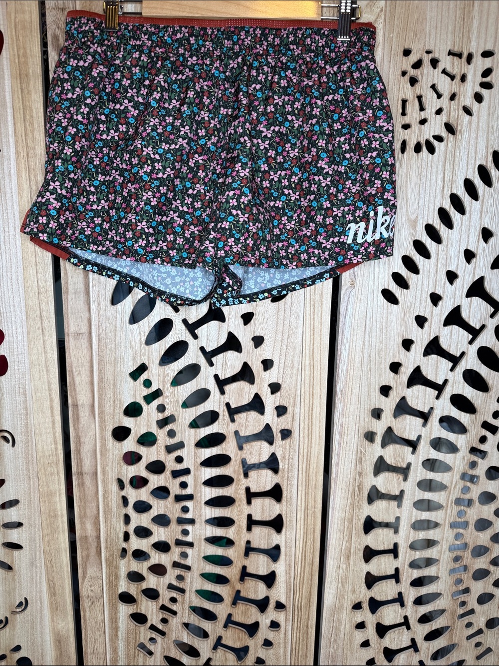 Nike Women's Black Floral Athletic Shorts with Pink & Teal Accents